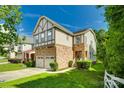 A delightful two-story home boasting stone accents and a well-manicured lawn at 13916 Mallard Lake Rd, Charlotte, NC 28262
