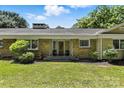 Charming front entrance with stone facade, decorative columns, and a welcoming wreath at 3127 N Center St, Hickory, NC 28601