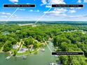 Aerial view of property highlighting lake access and proximity to Mooresville and Village at Byers Creek at 698 Normandy Rd, Mooresville, NC 28117