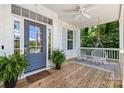 Cozy front porch featuring a swing and stylish decor at 319 Catawba Ave, Rock Hill, SC 29730