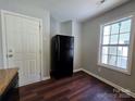 Kitchen area featuring new appliances and laminate flooring at 7315 Fig Ln, Charlotte, NC 28215