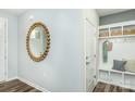 Home entryway featuring a decorative mirror, coat hooks, bench and a 'For Sale' sign on the floor at 1022 Kinship Dr # 118, Lancaster, SC 29720