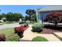Scenic street view showcases well-maintained landscaping and quiet residential charm at 406 Spyglass Hill Pl, Salisbury, NC 28144