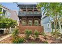 Stunning brick exterior featuring a charming balcony and well-maintained landscaping at 739 Terrace Park, Rock Hill, SC 29730