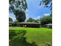 Expansive backyard offers ample green space and outdoor entertainment potential at 1512 Thompson Ave, Charlotte, NC 28216