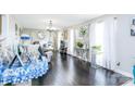 Elegant living room with hardwood floors, large windows and lots of light at 24132 Nc Hwy 73 Hwy, Albemarle, NC 28001