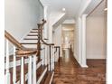 Spacious hallway featuring hardwood floors, detailed molding, and an open floor plan at 344 S Laurel Ave, Charlotte, NC 28207
