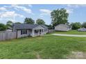 View of the house and a large, well-maintained lawn, showcasing the property's outdoor space at 810 4Th St, Kings Mountain, NC 28086