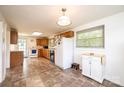 Bright kitchen with ample cabinet space, tile flooring, and modern appliances at 559 15Th Se Ave, Hickory, NC 28602