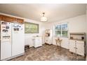 Eat-in kitchen features tile floors, natural light, and plentiful cabinets at 559 15Th Se Ave, Hickory, NC 28602