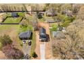 Aerial view of the property showcasing the house, yard, and surrounding neighborhood at 925 Marys Grove Rd, Cherryville, NC 28021