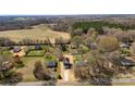 Expansive aerial view showcasing the home within its neighborhood context and landscape at 925 Marys Grove Rd, Cherryville, NC 28021