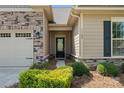 Inviting front door and meticulously landscaped walkway add curb appeal to this home at 1108 Mayapple Way, Belmont, NC 28012