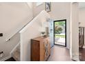 Bright foyer featuring beautiful floors and blue front door at 6422 Gatesville Ln, Charlotte, NC 28270
