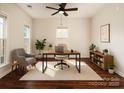 Inviting home office with modern decor, a large window, wood floors, and ample natural light at 119 Tilton Dr, Mooresville, NC 28115