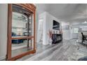 Bright living room with wood flooring, features modern decor and ample open space at 1504 Harpers Inlet Dr, Lake Wylie, SC 29710