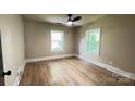 Bedroom with hardwood floors, neutral walls, and lots of natural light at 616 W Marion St, Shelby, NC 28150