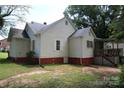 Back exterior with view of deck and yard at 1541 Kings Rd, Shelby, NC 28150