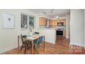 Inviting dining area with modern finishes, perfect for casual meals and entertaining at 207 N Dotger Ave # C14, Charlotte, NC 28207