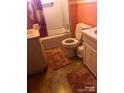Cozy bathroom with linoleum flooring, double sink vanity and tub at 410 Arthur Ave, Gastonia, NC 28052