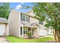 Charming two-story home with well-manicured lawn, integrated garage, and traditional design at 4412 Trillium Fields Dr, Charlotte, NC 28269