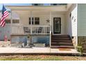 Inviting front porch with decorative elements and space for seating at 4567 Hickory Grove Rd, Sharon, SC 29742