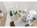 Grand foyer with high ceilings, staircase, and views of the dining and living areas at 7014 Walton Heath Ln, Charlotte, NC 28277