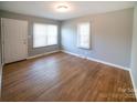 Inviting living room with hardwood floors, freshly painted walls, and plenty of natural light at 326 Gorrell St, Shelby, NC 28152