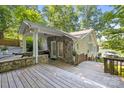 Inviting entrance showcasing the home's unique architecture and lakeside access at 208 Island View Rd, Mount Holly, NC 28120