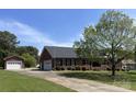 Spacious home with detached garage, set on a large lot with mature trees and long driveway at 2515 Myra Ln, Lincolnton, NC 28092
