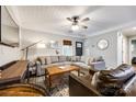 Cozy living room with comfortable seating, stylish decor, and wood-look ceiling paneling at 2984 Starnes Dr, Rock Hill, SC 29730