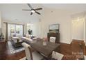 Bright living room features hardwood floors, vaulted ceiling, and neutral paint colors at 703 Dalebrook Ln, Rock Hill, SC 29730