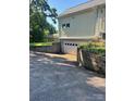 View of the long driveway leading to a garage beneath the home at 743 S College Ave, Newton, NC 28658