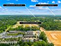 Aerial view of townhomes with quick access to I-77 and 15 minute walk to Downtown Huntersville at 13920 Winmau Ln, Huntersville, NC 28078