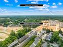 Aerial view of townhomes, with a 9 minute drive to Birkdale Village at 13920 Winmau Ln, Huntersville, NC 28078