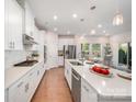 Bright, open kitchen with stainless steel appliances, a large island, and pendant lighting at 9311 Dunwich Dr, Gastonia, NC 28056