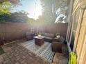 Cozy outdoor patio featuring stylish furniture and string lights for evening enjoyment at 1013 Park West Dr # 5, Charlotte, NC 28209