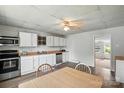 Functional kitchen with light wood countertops, white cabinets, and stainless steel appliances at 310 Sidney Johnson St, Fort Mill, SC 29715