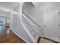 Inviting foyer with hardwood floors and staircase leading to the upper level at 918 Kite Dr, Fort Mill, SC 29715