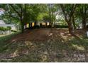 Two-story home on a lovely lot surrounded by mature trees at 12325 Woodside Falls Rd, Pineville, NC 28134