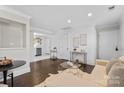 This cozy living room is adjacent to a clean, modern kitchen at 404 Wakefield Dr # C, Charlotte, NC 28209