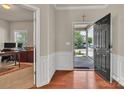 Welcoming foyer with hardwood floors and a view into a bright office space, ideal for working from home at 1112 Wagner Ave # 335, Fort Mill, SC 29715