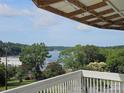 Scenic lake view from a private balcony, showing lush greenery and blue waters at 500 Steel Bridge Loop, Hickory, NC 28601