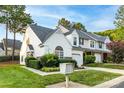 Exterior view of home displaying manicured lawn and white siding at 11531 Delores Ferguson Ln, Charlotte, NC 28277
