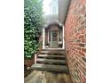 Welcoming front porch with decorative wreath and steps leading to the home's entrance at 1344 Moonshadow Ln, Shelby, NC 28150