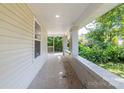 Spacious covered porch with brick accents, offering a relaxing outdoor space at 1818 Stowe Ave, Gastonia, NC 28054