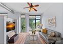 Bright living room featuring modern furniture, large windows, and stylish decor at 514 W 10Th St # 302, Charlotte, NC 28202