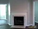 Inviting living room with a fireplace and hardwood floors at 5855 Amity Springs Dr, Charlotte, NC 28212
