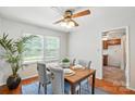Inviting dining room with elegant table setting, stylish chairs, and ample natural light at 6319 Welford Rd, Charlotte, NC 28211