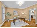 Bright home office with hardwood floors, natural light, and a view through doorway at 1019 Westlake Dr, Kannapolis, NC 28081